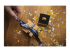 Brother TZe-RN34 - Gold on navy blue - Right-angle