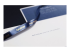 Brother TZe-RN34 - Gold on navy blue - Close up